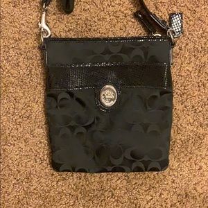 Black, crossbody Coach brand